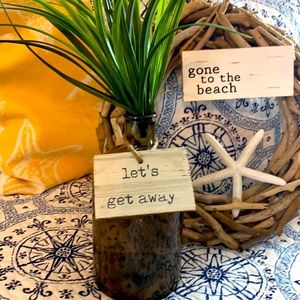 Beautiful brown MudPie bottle Let’s get away tag